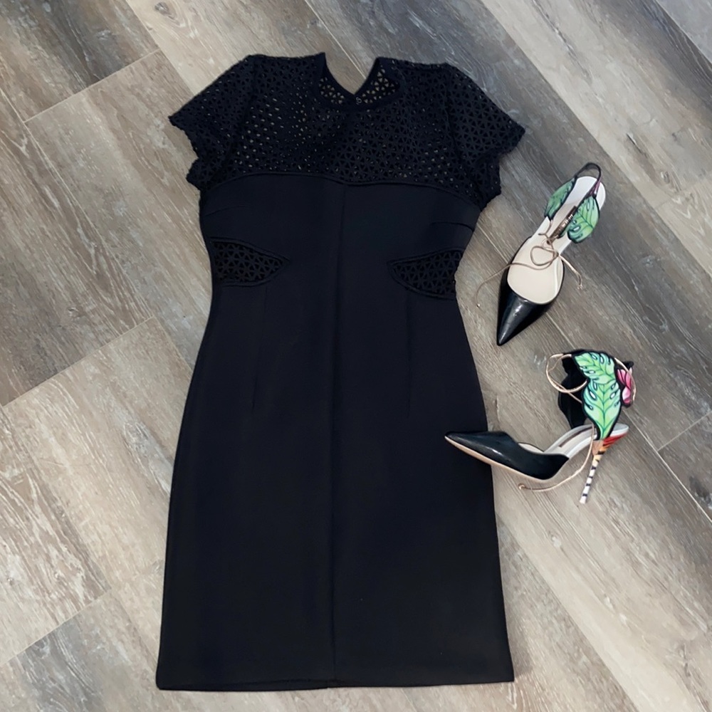 Allen B. Woman black scuba dress with eyelet details at top and sides size small